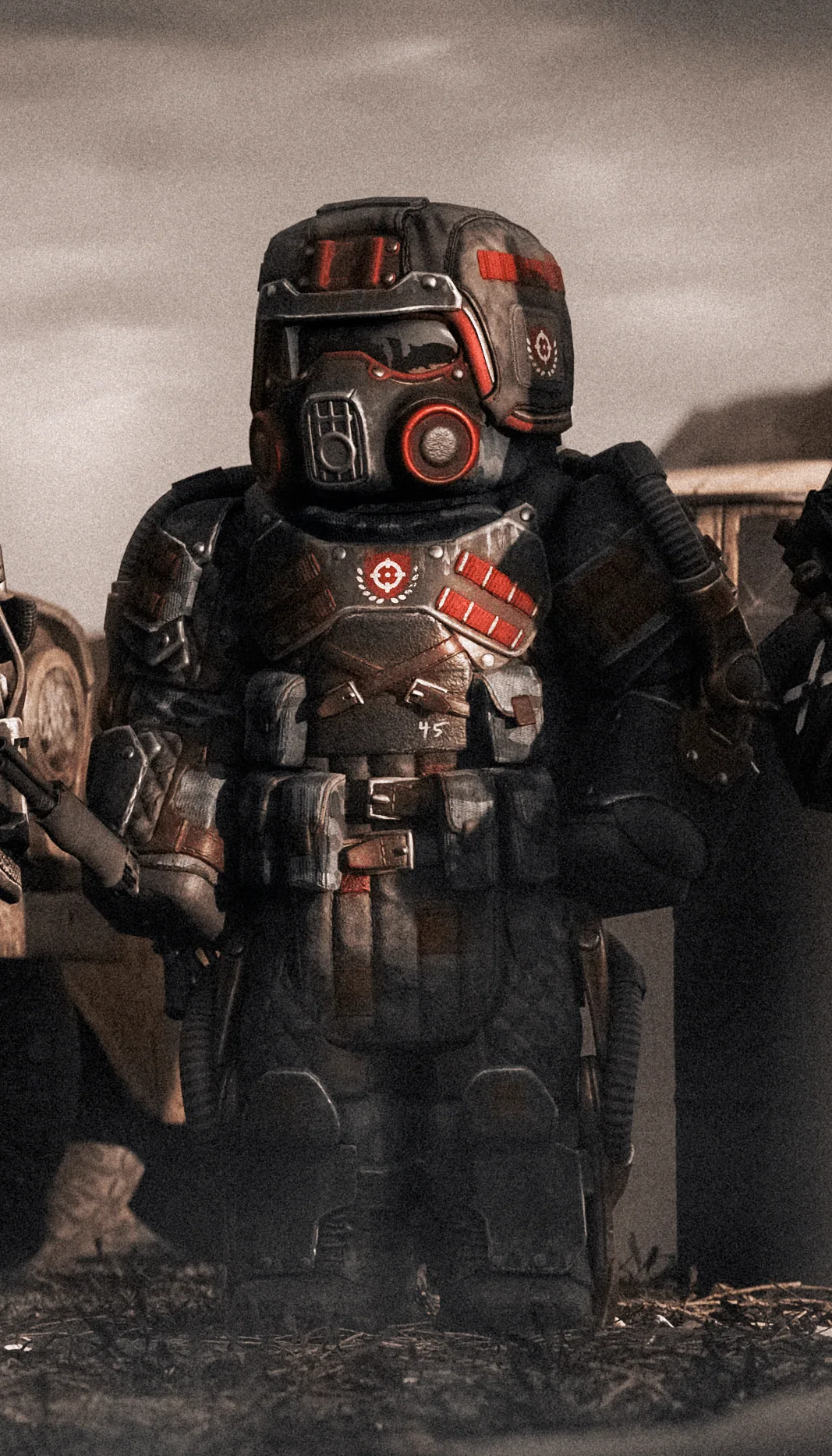 A Mercenary in red-striped heavy armour, from the official STALZONE faction line-up